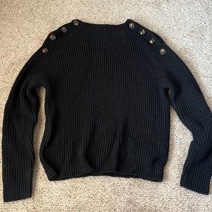 Black sweater with buttons on shoulders. Believe it’s from Francesca’s